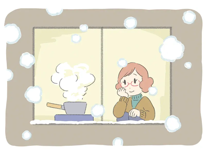 窓から外の房総雪景色を眺める